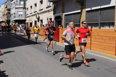 Participantes en la carrera popular disputada este domingo 11 de agosto.,