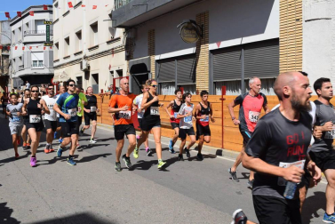 Participantes en la carrera popular disputada este domingo 11 de agosto.,