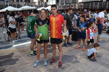 Participantes en la carrera popular disputada este domingo 11 de agosto.,