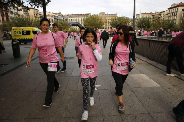 Imágenes de la carrera solidaria contra el cáncer de mama organizada por Saray.