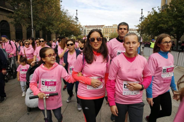 Imágenes de la carrera solidaria contra el cáncer de mama organizada por Saray.