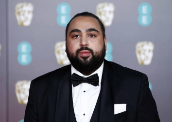 El negro, salvo algunas excepciones, fue el rey de la alfombra roja de los Bafta del cine británico.