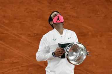 Galería de fotos de la victoria de Rafa Nadal ante Novak Djokovic en Roland Garros. El tenista balear suma su 13º triunfo en París.