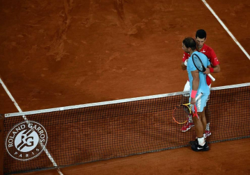 Galería de fotos de la victoria de Rafa Nadal ante Novak Djokovic en Roland Garros. El tenista balear suma su 13º triunfo en París.
