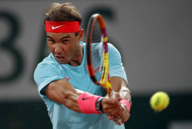 Galería de fotos de la victoria de Rafa Nadal ante Novak Djokovic en Roland Garros. El tenista balear suma su 13º triunfo en París.
