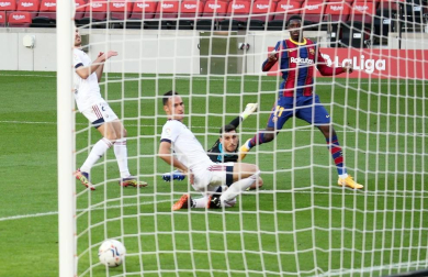 Imágenes del encuentro entre Barcelona y Osasuna, que han ganado los culés por 4-0.