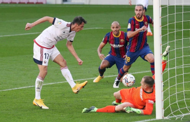 Imágenes del encuentro entre Barcelona y Osasuna, que han ganado los culés por 4-0.