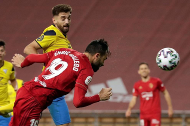 Imágenes del partido de primera ronda de Copa del Rey entre el Tomares y Osasuna, disputado en el estadio de La Cartuja.