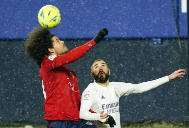 Imágenes de las horas previas y del partido Osasuna-Real Madrid, correspondiente a la jornada 18 y marcado por el paso de la borrasca Filomena.