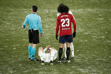 Imágenes de las horas previas y del partido Osasuna-Real Madrid, correspondiente a la jornada 18 y marcado por el paso de la borrasca Filomena.