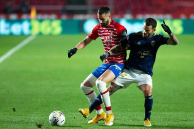 Imágenes del partido que enfrenta a Granada y Osasuna en el estadio Nuevo Los Cármenes