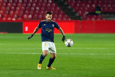Imágenes del partido que enfrenta a Granada y Osasuna en el estadio Nuevo Los Cármenes