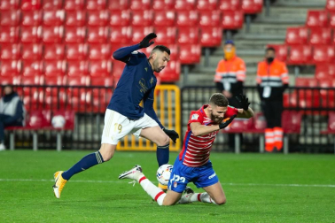 Imágenes del partido que enfrenta a Granada y Osasuna en el estadio Nuevo Los Cármenes