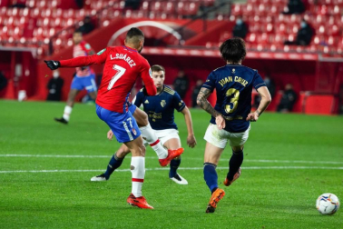 Imágenes del partido que enfrenta a Granada y Osasuna en el estadio Nuevo Los Cármenes