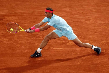 Galería de fotos de la victoria de Rafa Nadal ante Novak Djokovic en Roland Garros. El tenista balear suma su 13º triunfo en París.