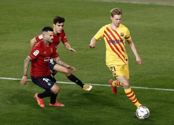 Imágenes del partido entre Osasuna y Barcelona disputado en El Sadar.