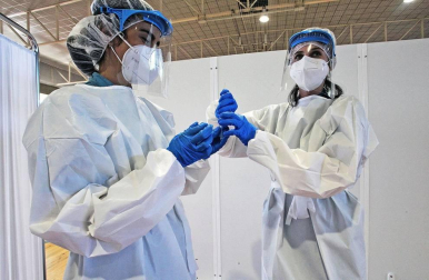 Fotografías de la exposición 'Crónica de un año de pandemia' organizada por la Asociación de Reporteros Gráficos de Navarra