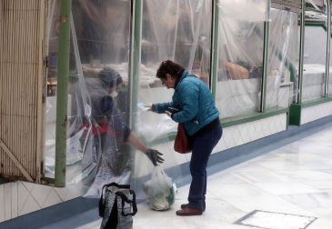 Fotografías de la exposición 'Crónica de un año de pandemia' organizada por la Asociación de Reporteros Gráficos de Navarra