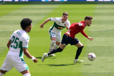 Imágenes del partido Osasuna-Elche disputado en El Sadar.