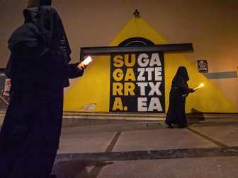 Imágenes de la procesión del Santo Entierro en Estella./