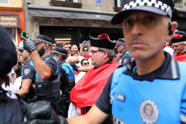 Incidentes durante la procesión de San Fermín.