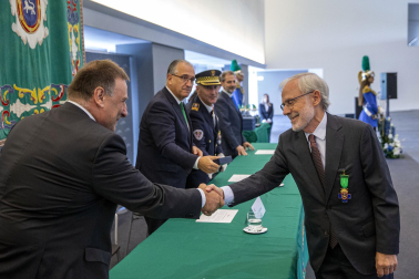 Fotos del acto de la Policía Municipal de Pamplona en honor a su patrón San Miguel. /