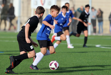 Imágenes del encuentro Lorenzo Goikoa 3 - 3 Virgen Blanca de la segunda jornada del XL Torneo Interescolar.