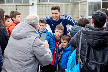 Fotos de los aficionados en el entrenamiento de "carnaval" de Osasuna./