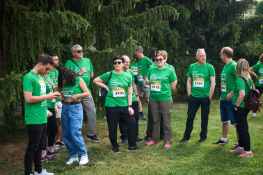 Fotos de la novena marcha solidaria contra el cáncer en Pamplona./