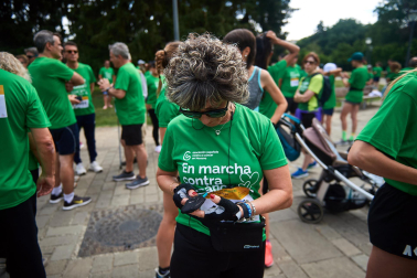 Fotos de la novena marcha solidaria contra el cáncer en Pamplona./