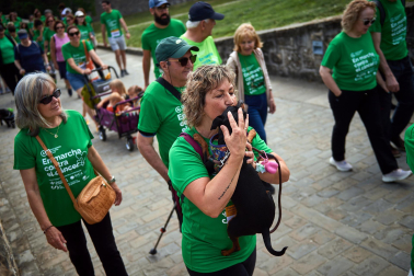 Fotos de la novena marcha solidaria contra el cáncer en Pamplona./