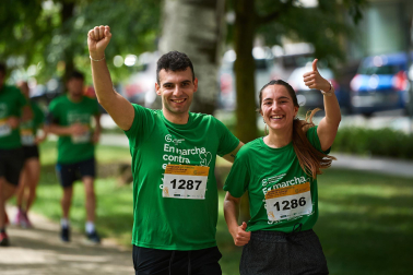 Fotos de la novena marcha solidaria contra el cáncer en Pamplona./