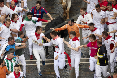 Fotos del primer encierro de San Fermín 2023, con toros de la ganadería La Palmosilla.