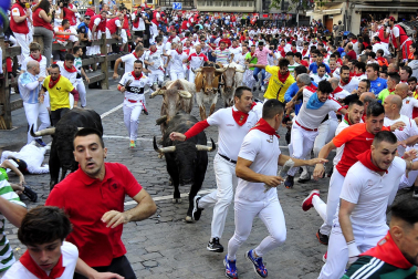 Imágenes del cuarto encierro de San Fermín 2023.