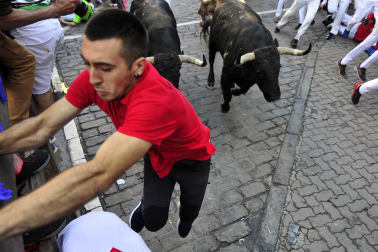 Imágenes del cuarto encierro de San Fermín 2023.