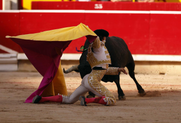 Fotos de la octava y última corrida de la Feria de San Fermín./