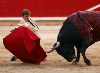 Fotos de la octava y última corrida de la Feria de San Fermín./