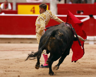 Fotos de la octava y última corrida de la Feria de San Fermín./