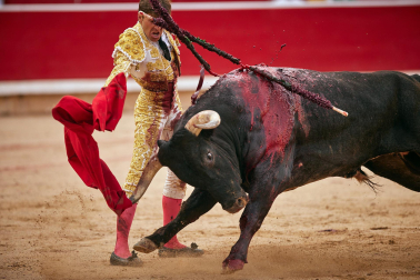 Fotos de la octava y última corrida de la Feria de San Fermín./