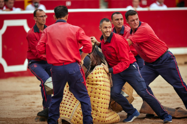 Fotos de la octava y última corrida de la Feria de San Fermín./