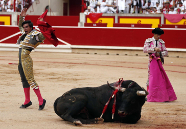 Fotos de la octava y última corrida de la Feria de San Fermín./