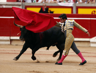 Fotos de la octava y última corrida de la Feria de San Fermín./