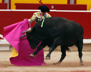 Fotos de la octava y última corrida de la Feria de San Fermín./