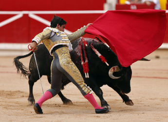 Fotos de la octava y última corrida de la Feria de San Fermín./