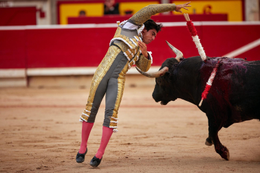 Fotos de la octava y última corrida de la Feria de San Fermín./