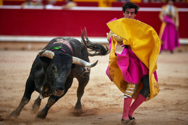 Fotos de la octava y última corrida de la Feria de San Fermín./