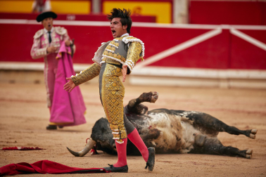 Fotos de la octava y última corrida de la Feria de San Fermín./
