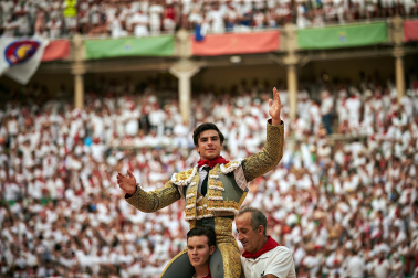 Fotos de la octava y última corrida de la Feria de San Fermín./