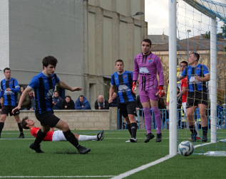 Fotos del partido entre Zarramonza y la Universidad de Navarra