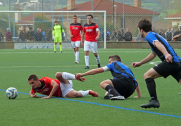 Fotos del partido entre Zarramonza y la Universidad de Navarra